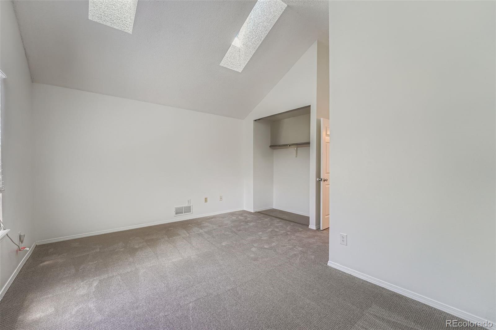 17315 East Rice Circle, Unit G Aurora, CO 80015 - Photo 22 of 31 an empty room with an entryway
