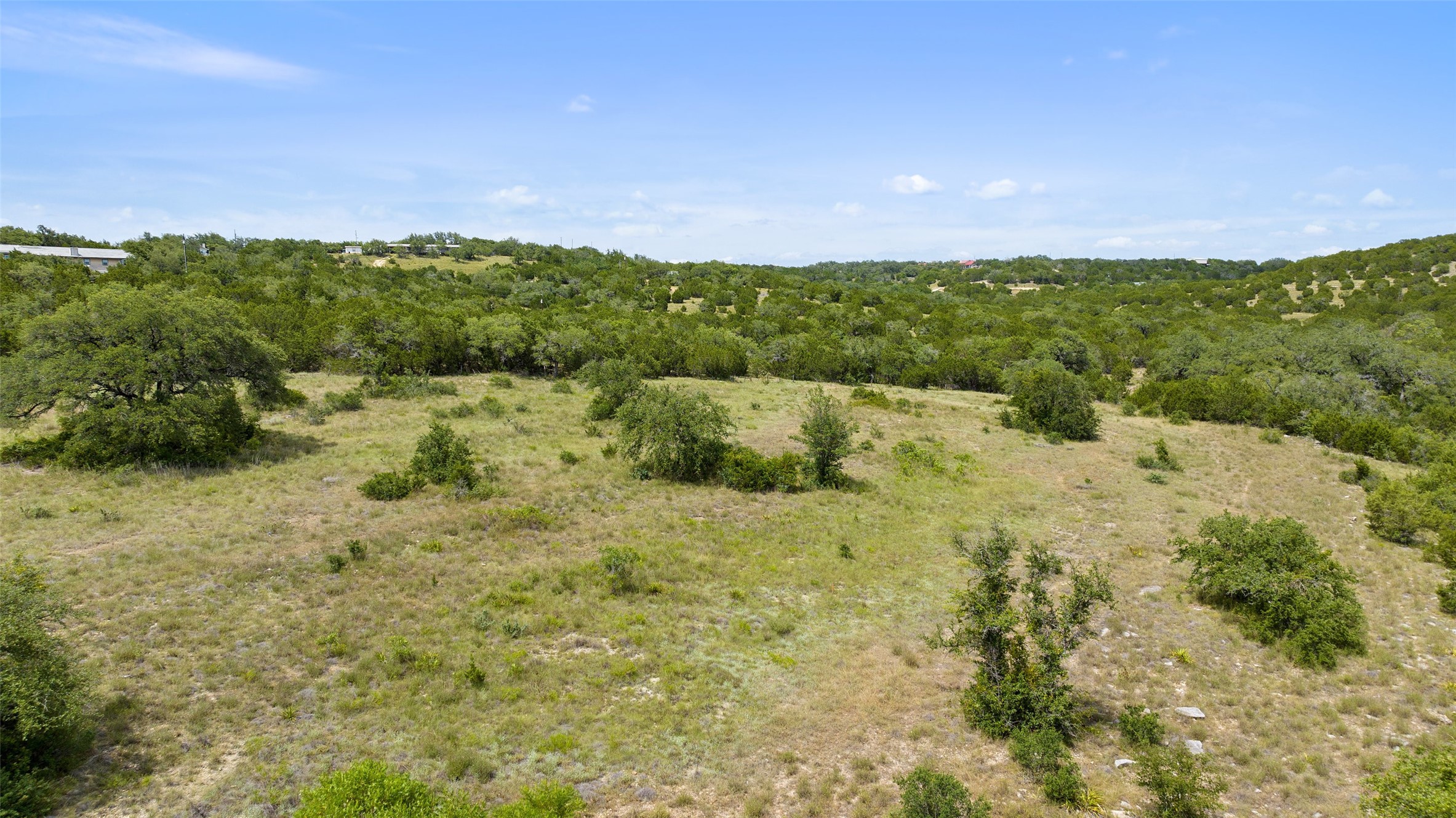 Tbd Fall Creek Road Spicewood, TX 78669 - Photo 11 of 13 a view of a big yard with lots of green space