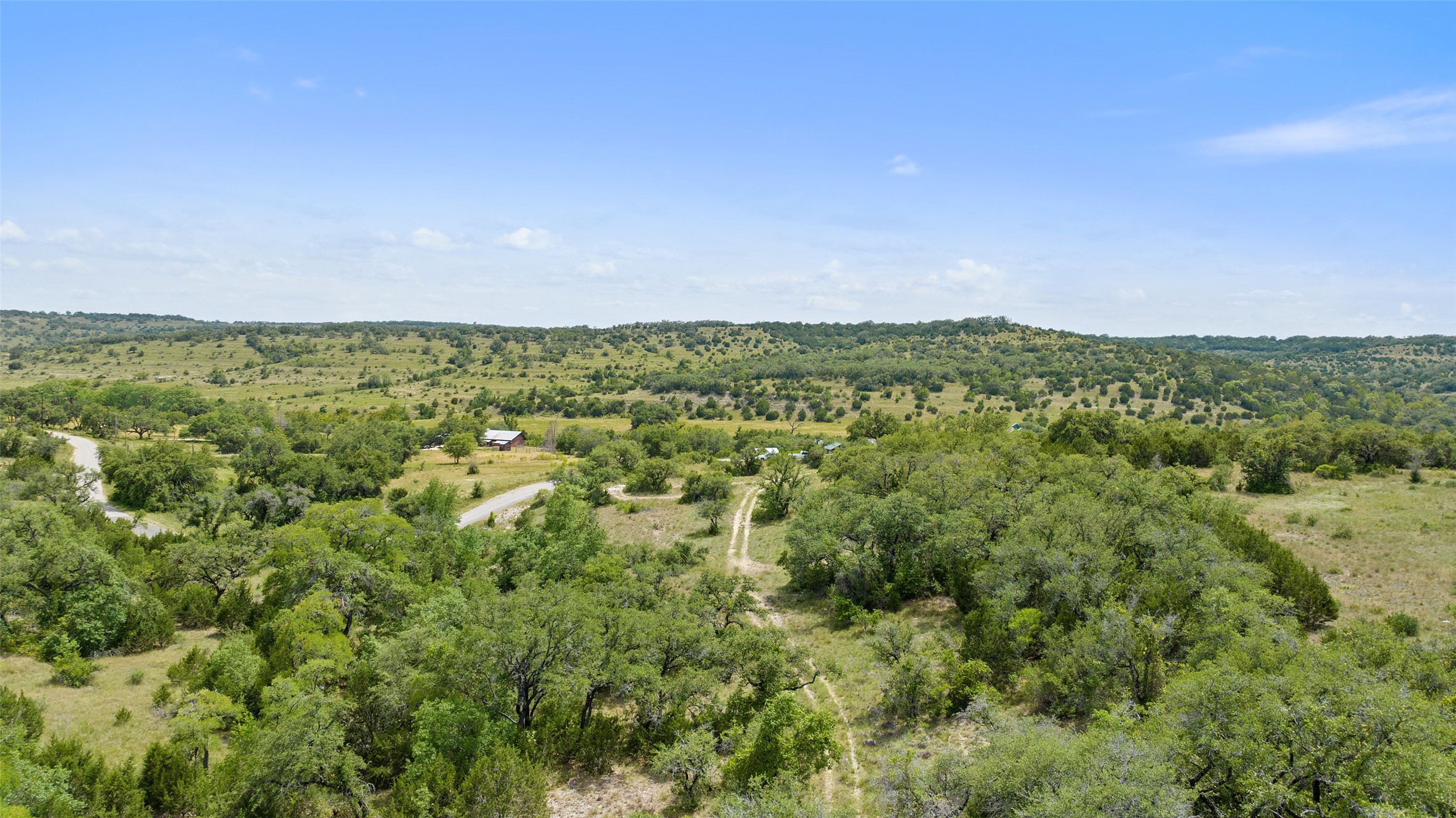 Tbd Fall Creek Road Spicewood, TX 78669 - Photo 13 of 13 an aerial view of residential houses with outdoor and green space