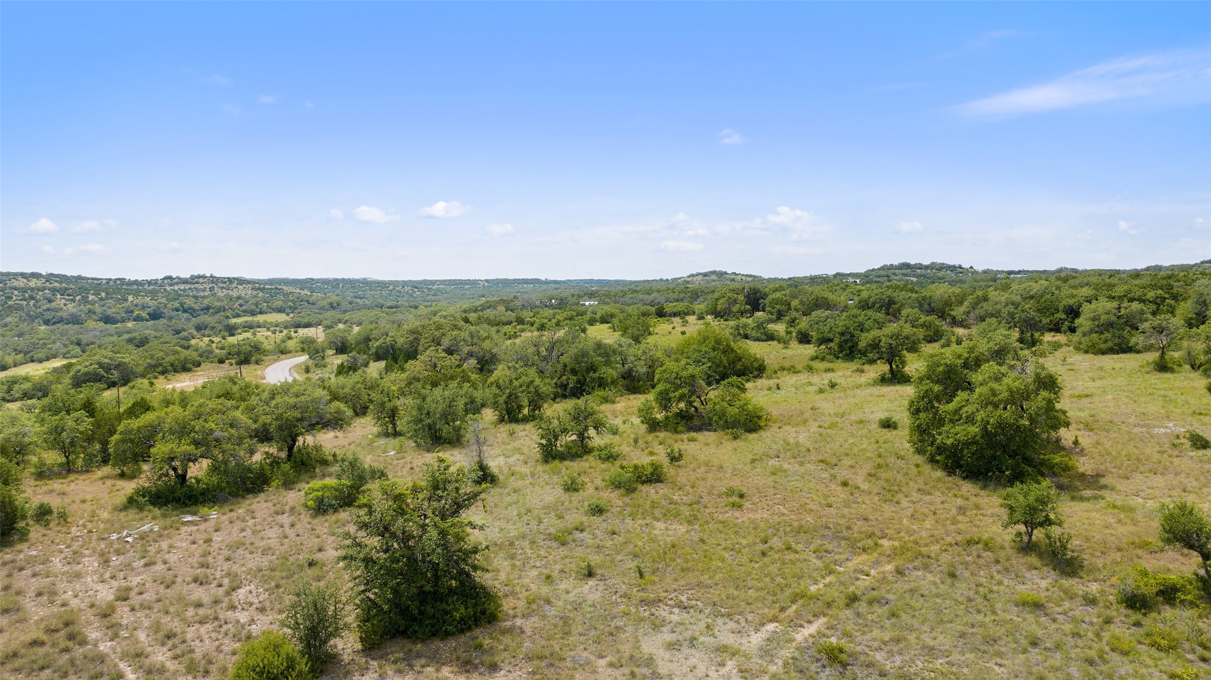 Tbd Fall Creek Road Spicewood, TX 78669 - Photo 4 of 13 a view of a lake with mountains in the background