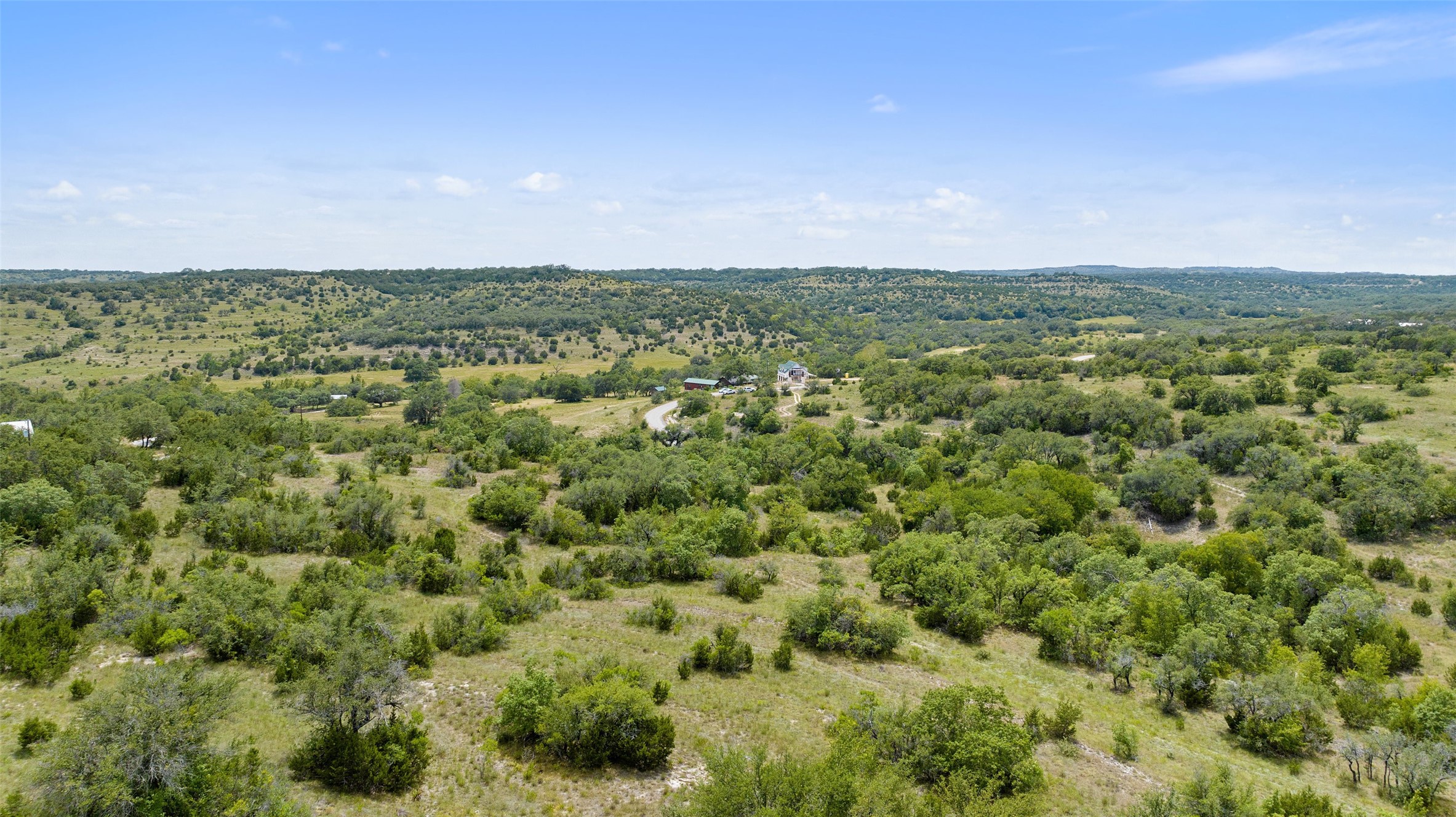 Tbd Fall Creek Road Spicewood, TX 78669 - Photo 9 of 13 a view of a big yard with lots of green space