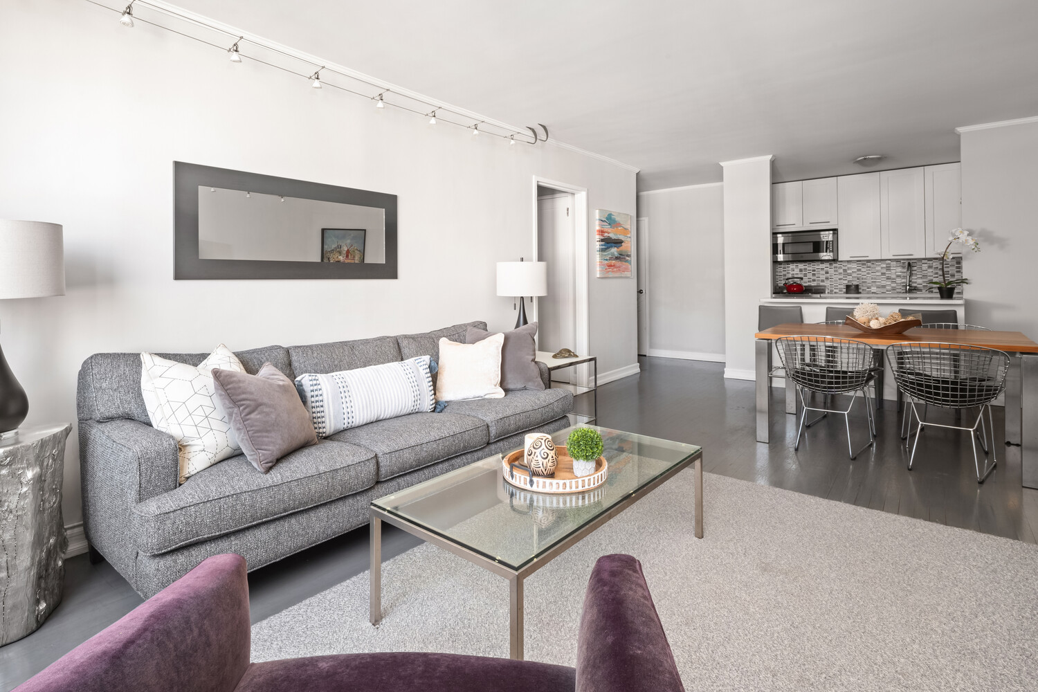 200 West 79th Street, Unit 12P Manhattan, NY 10024 - Photo 3 of 10 a living room with furniture kitchen view and a table