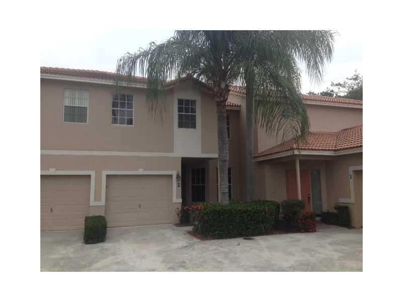 20951 Via Alamanda, Unit 2 Boca Raton, FL 33428 - Photo 1 of 14 Exterior Front