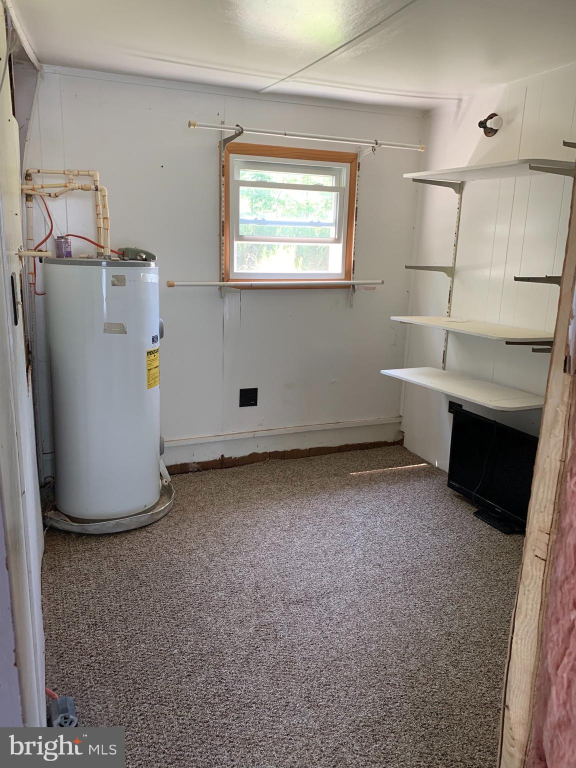 5816 Cornstack Road Marion Station, MD 21838 - Photo 6 of 9 a view of a room with storage and utility