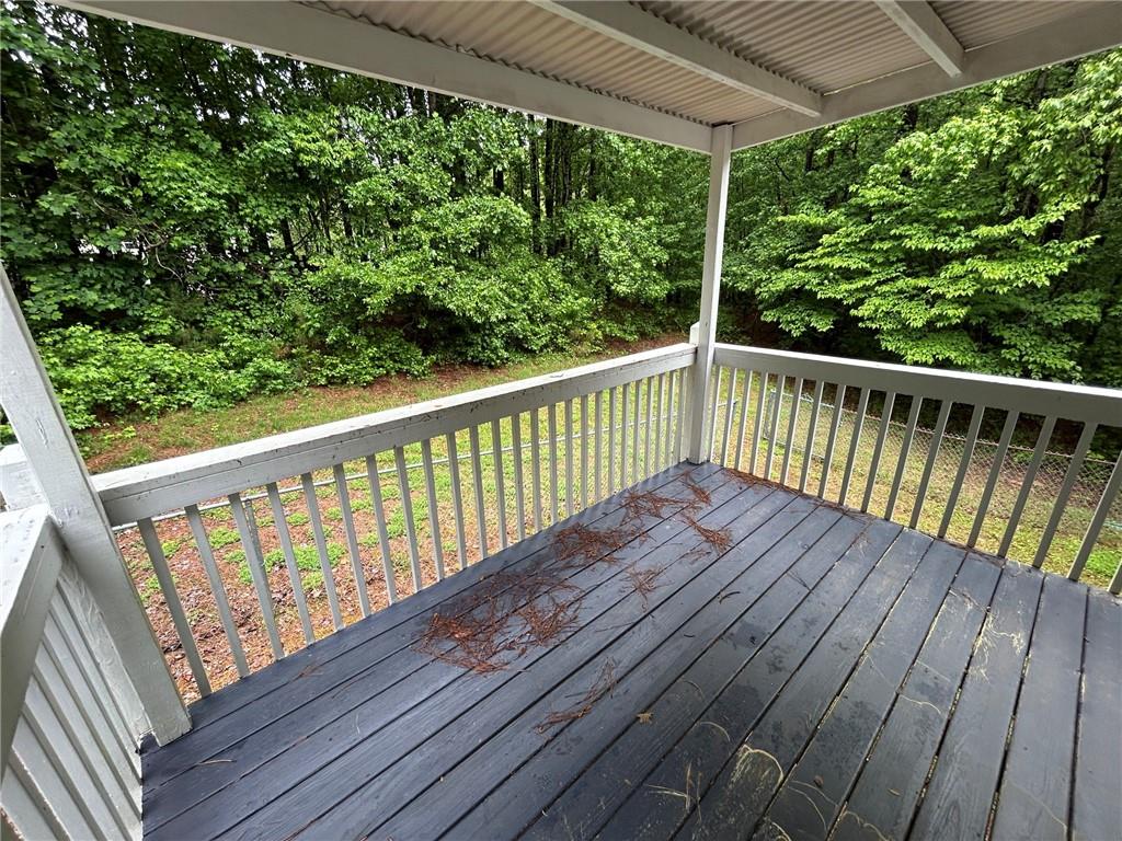 95 Luke Drive Dallas, GA 30132 - Photo 3 of 15 a view of balcony with wooden floor