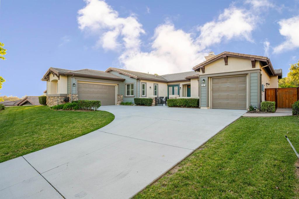 853 Hidden View Lane Escondido, CA 92027 - Photo 1 of 1 a front view of a house with a yard