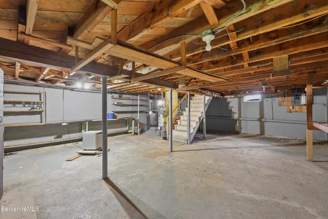 a picture of a bathroom with a shower