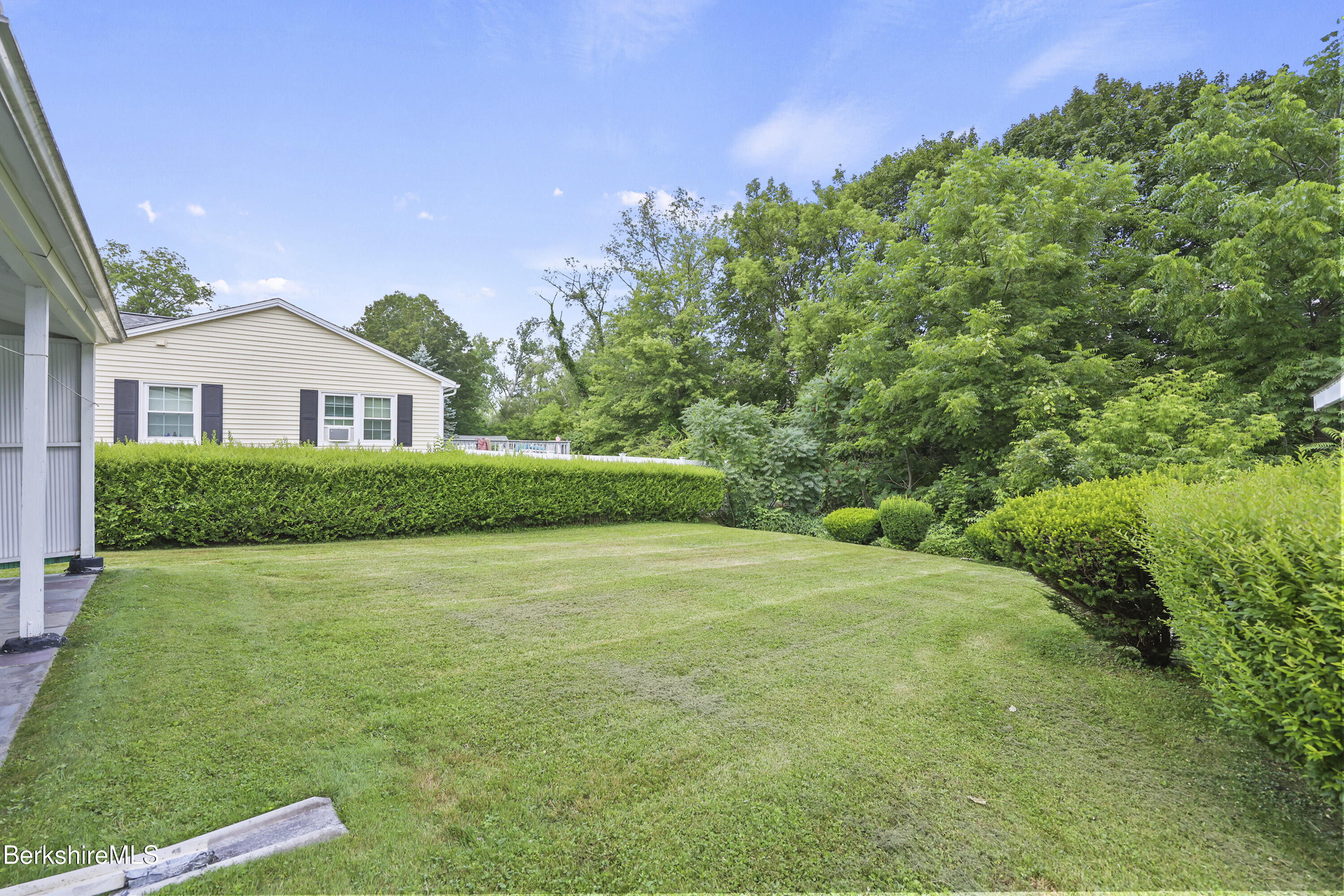 505 Barbour Street North Adams, MA 01247 - Photo 29 of 32 a front view of a house with a garden