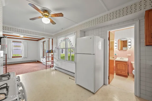 a view of a hallway with windows