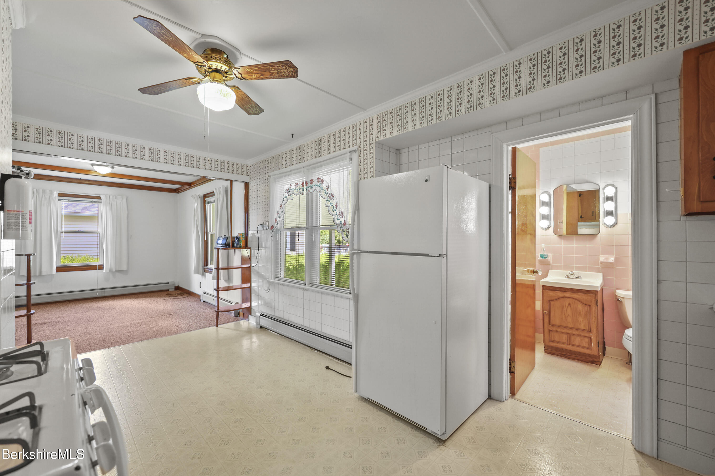 505 Barbour Street North Adams, MA 01247 - Photo 8 of 32 a view of a livingroom with furniture and a hallway