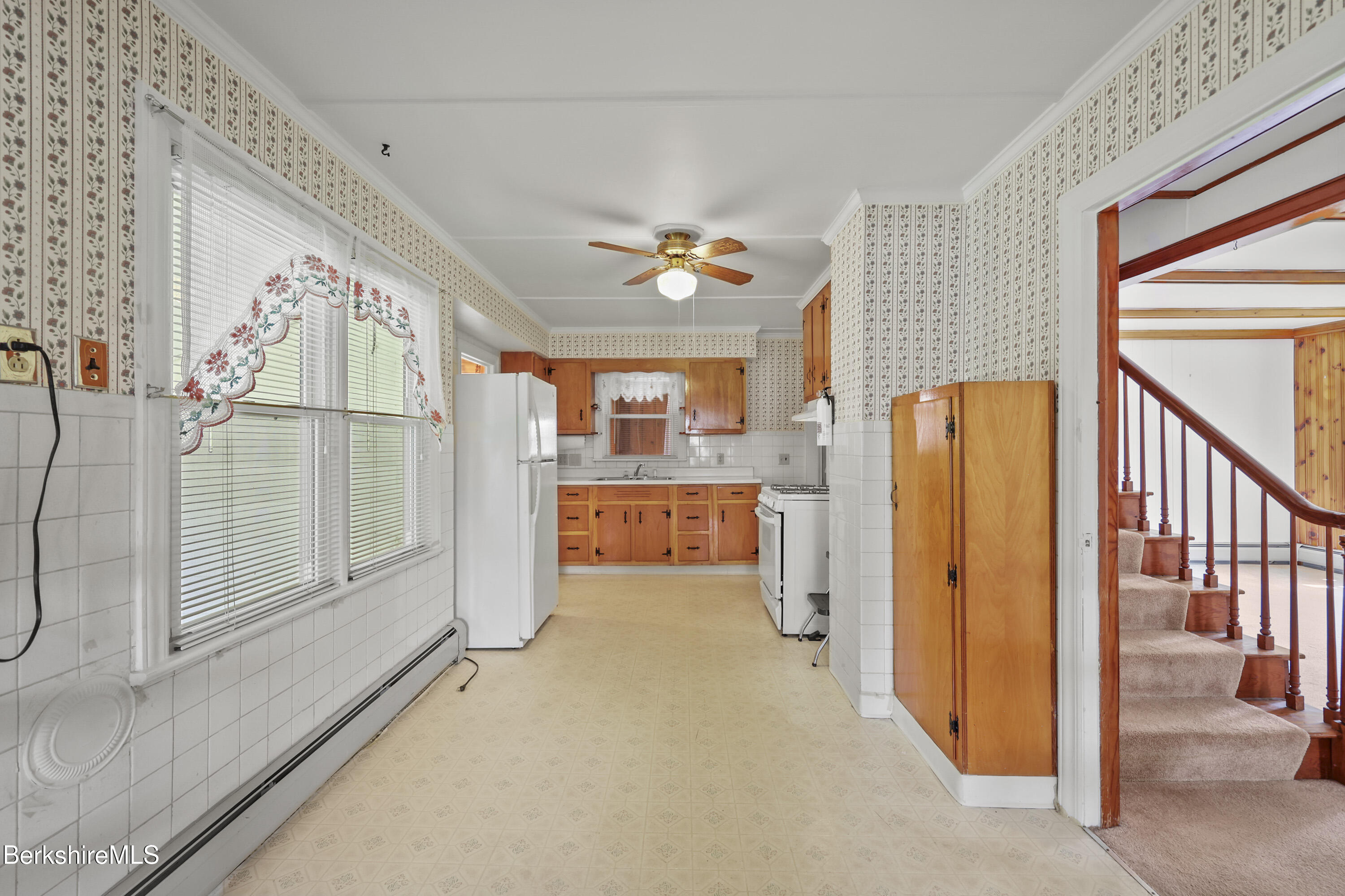 505 Barbour Street North Adams, MA 01247 - Photo 9 of 32 a view of a hallway with windows
