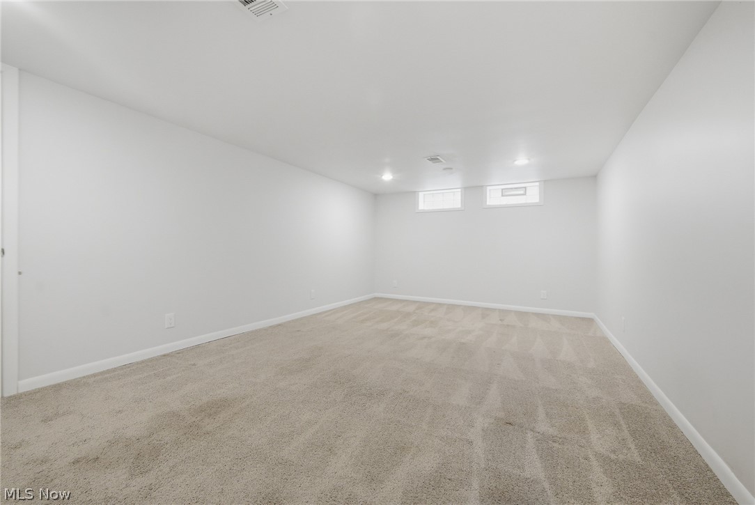3722 Lindholm Road Shaker Heights, OH 44120 - Photo 29 of 34 Spacious room featuring light-colored carpeting, white walls, and recessed lighting