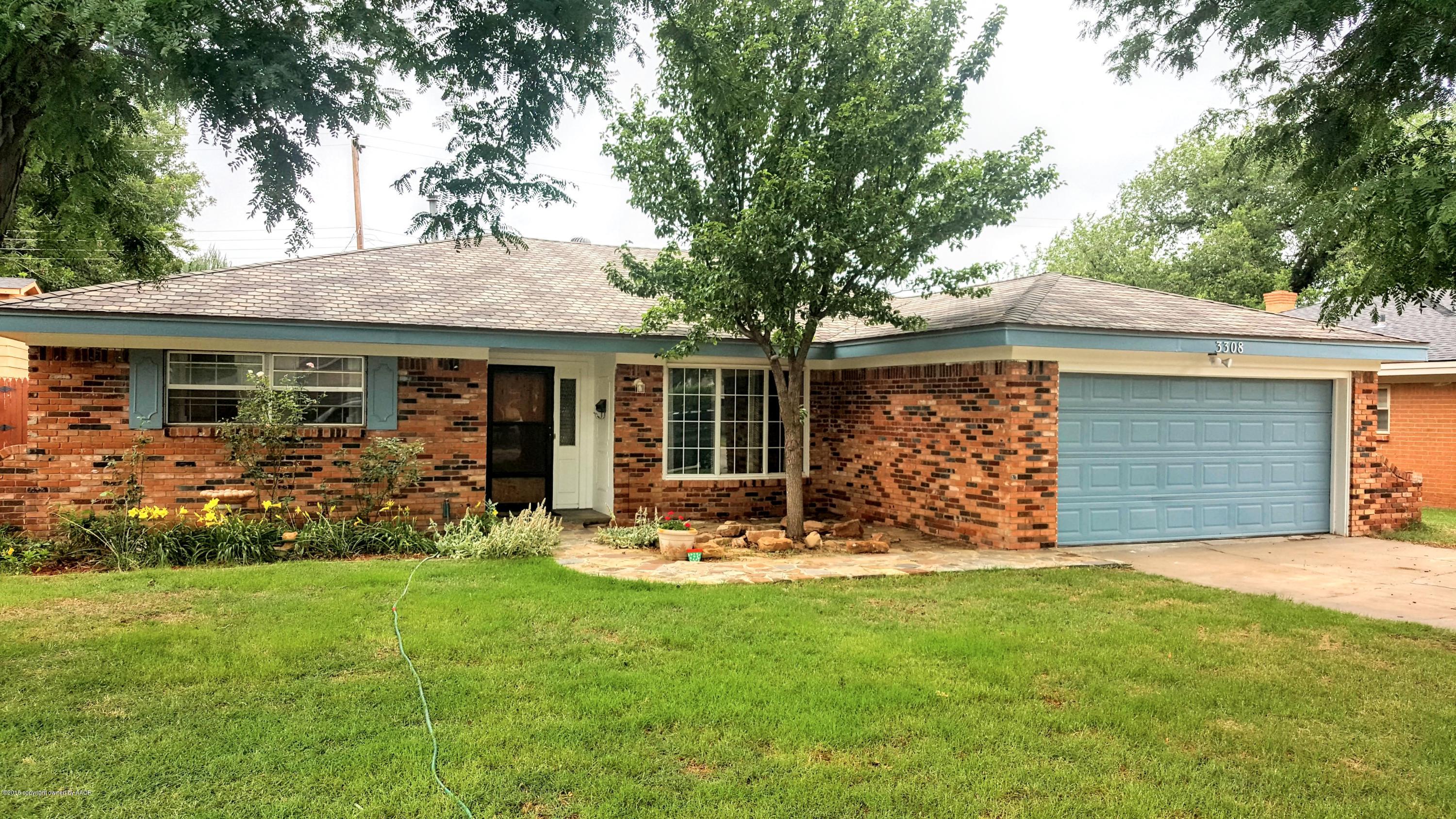 3308 Bedford Road Amarillo, TX 79106 - Photo 1 of 31 a view of a house with backyard and garden