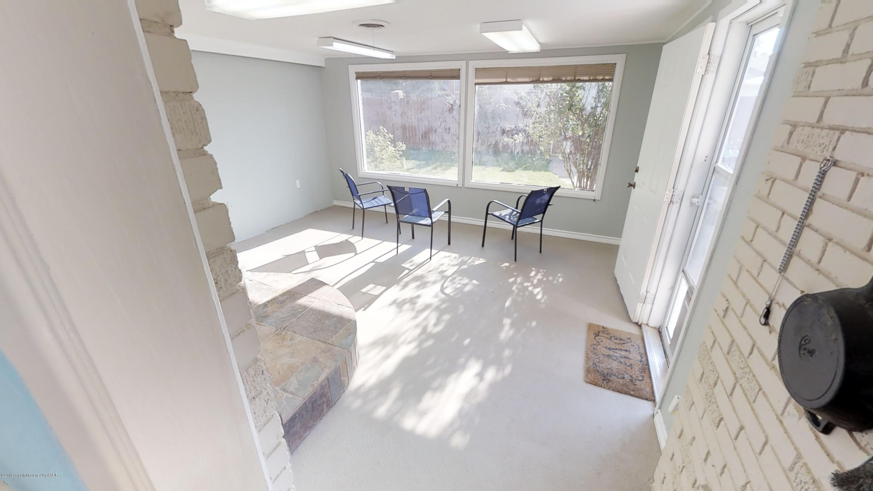 3308 Bedford Road Amarillo, TX 79106 - Photo 23 of 31 a view of a dining room with furniture window and wooden floor