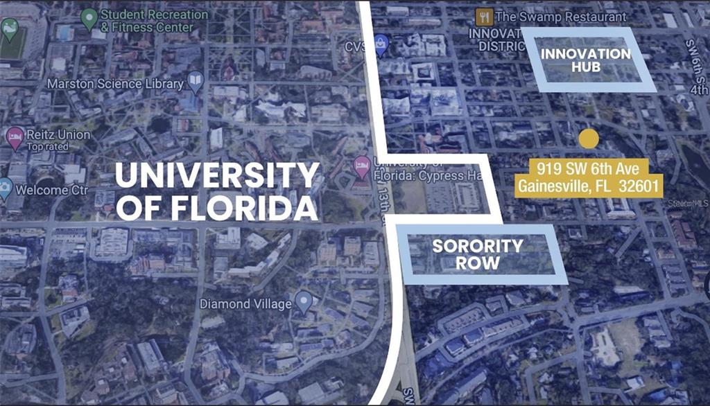 921 Southwest 6th Avenue, Unit B Gainesville, FL 32601 - Photo 2 of 18 a sign board with a brick wall