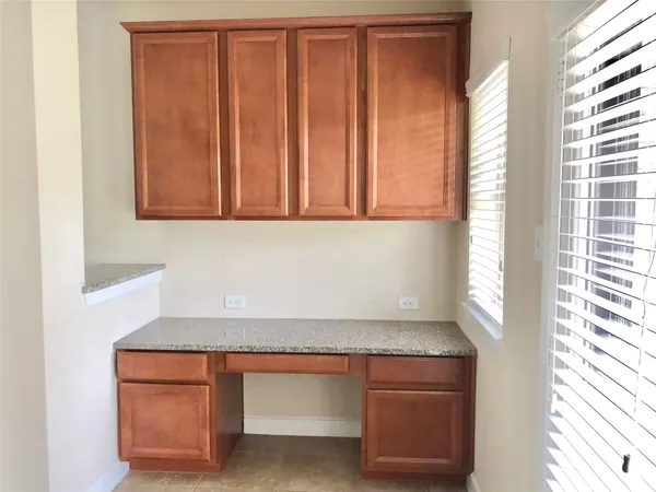 a view of a hallway with a white walls