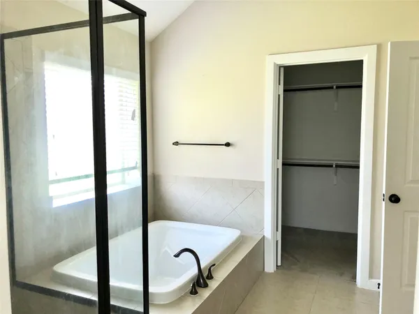 a bathroom with a bathtub