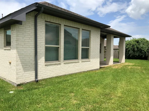 a view of a playground with basketball court
