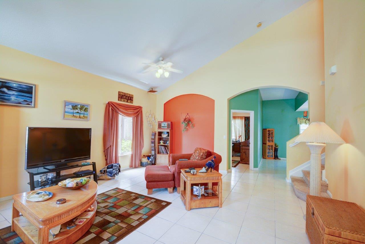 2414 Southeast Springtree Place Stuart, FL 34997 - Photo 4 of 28 Springtree living room 2