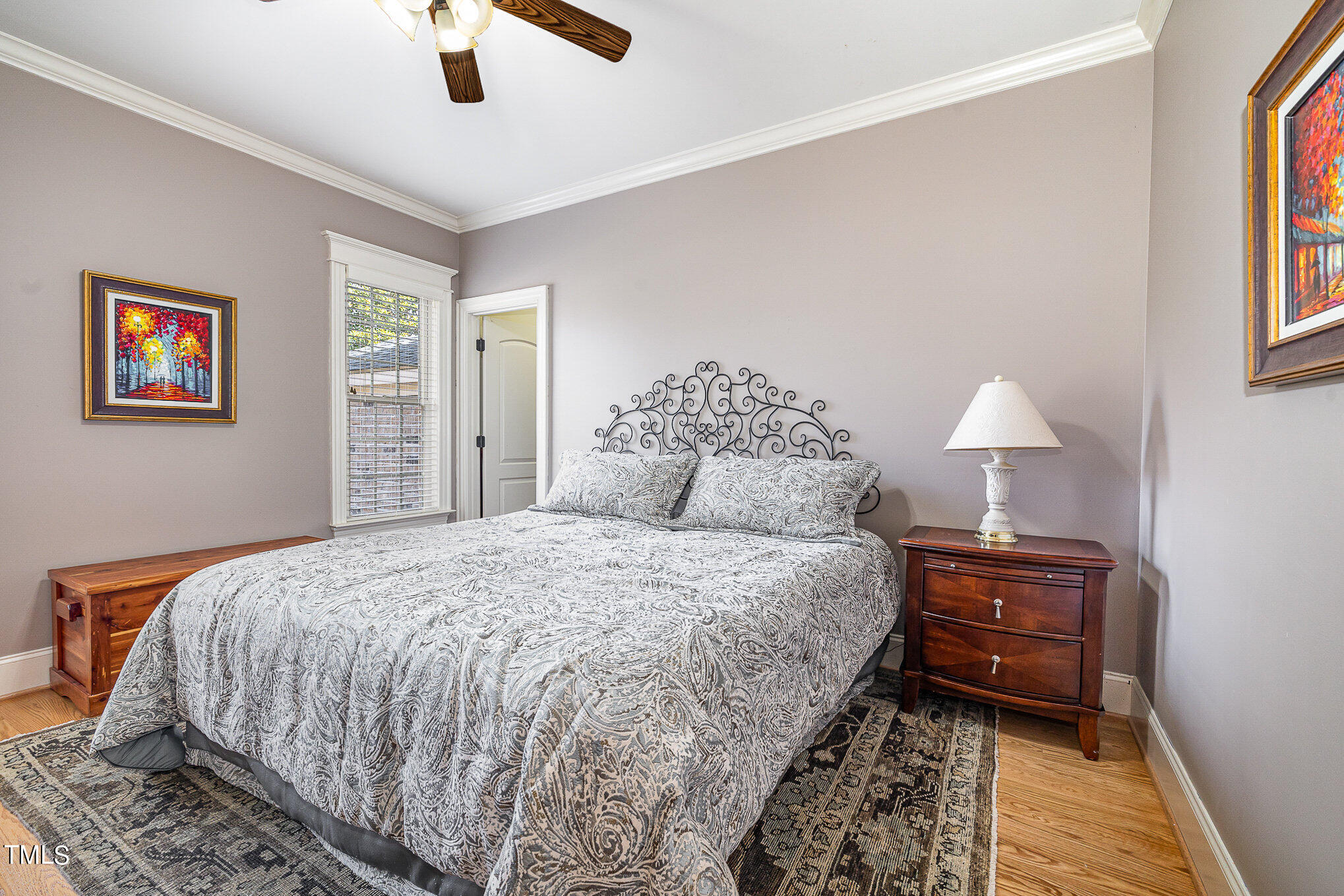 96 Barringer Drive Garner, NC 27529 - Photo 20 of 35 a bedroom with a bed and night stand