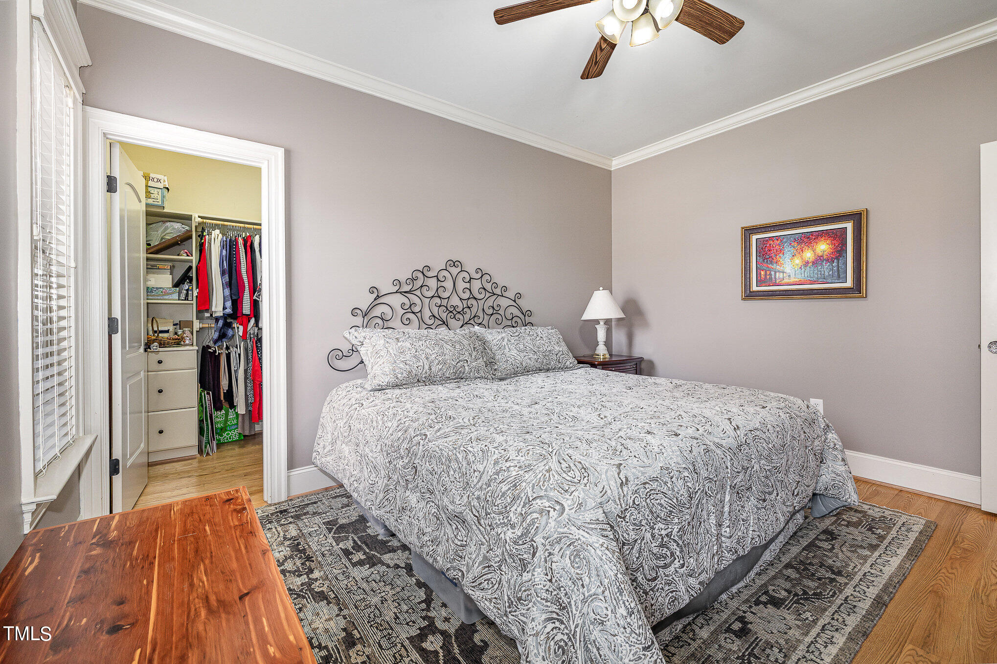 96 Barringer Drive Garner, NC 27529 - Photo 21 of 35 a bedroom with bed and a chandelier