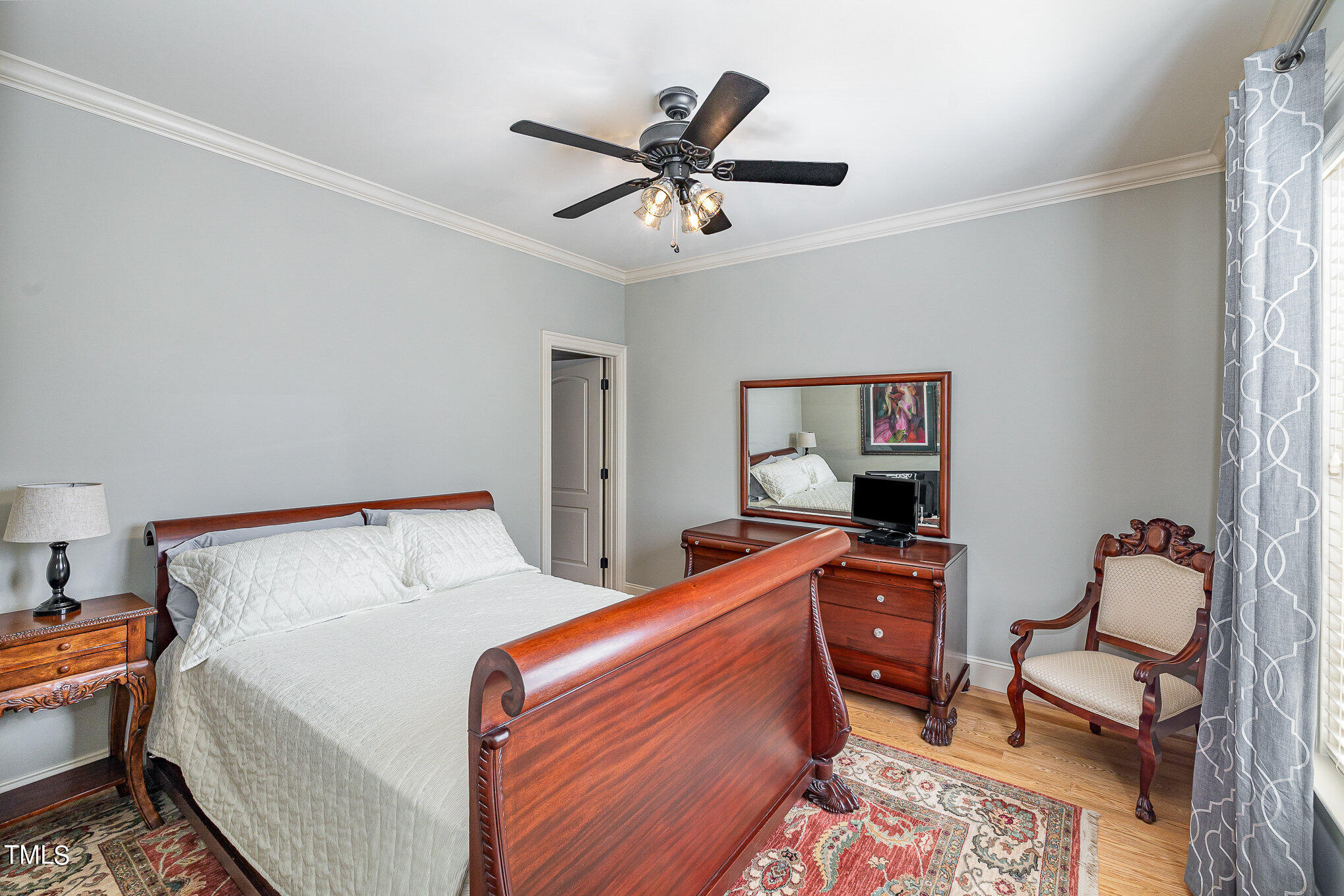 96 Barringer Drive Garner, NC 27529 - Photo 22 of 35 a bed room with a bed and a couch