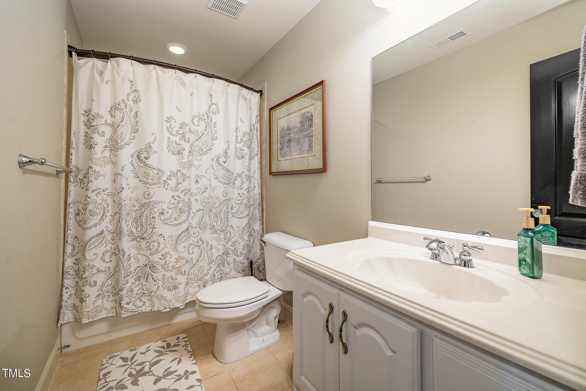 96 Barringer Drive Garner, NC 27529 - Photo 24 of 35 a bathroom with a sink toilet and shower