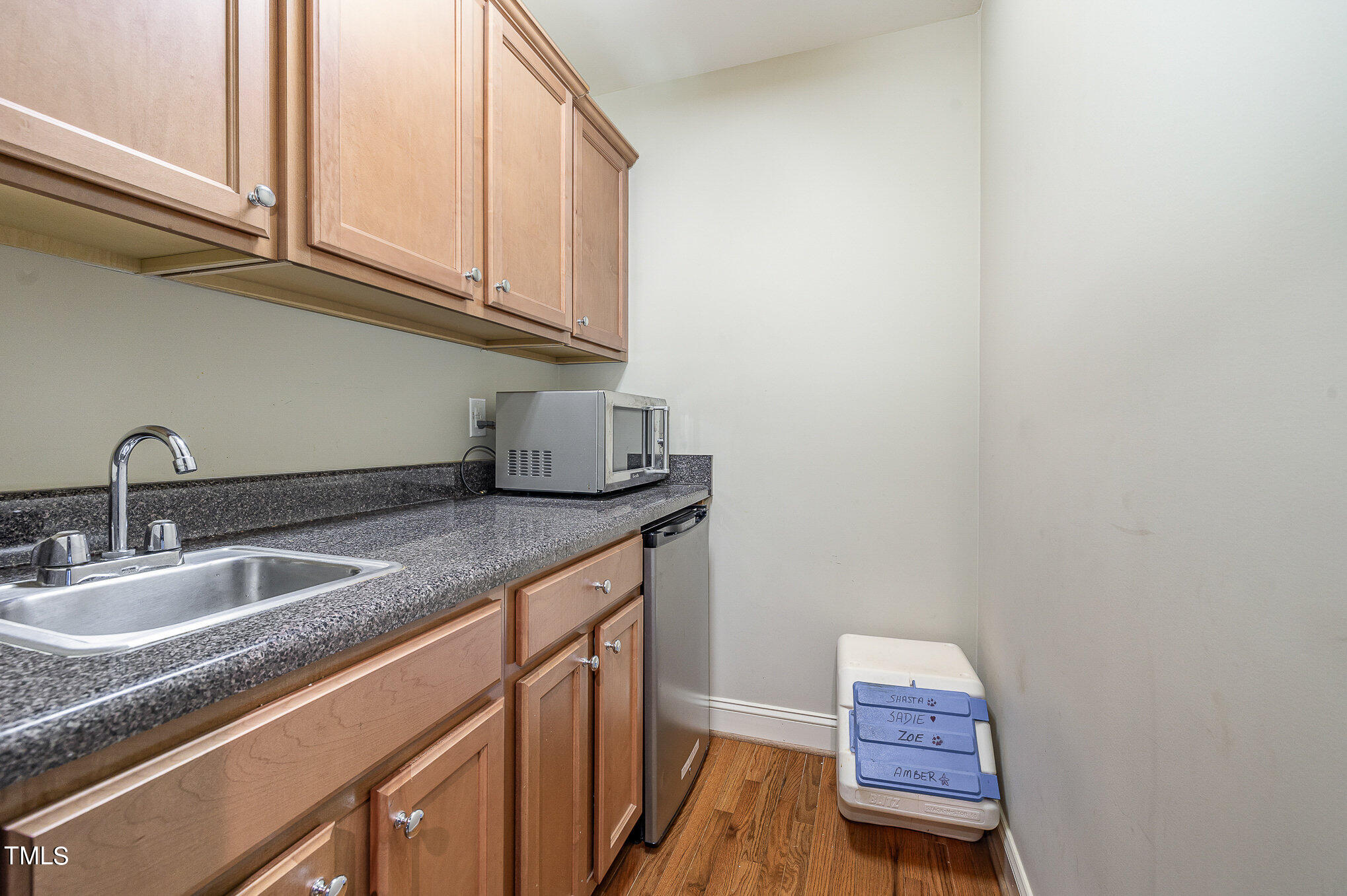 96 Barringer Drive Garner, NC 27529 - Photo 25 of 35 a kitchen with a sink and cabinets