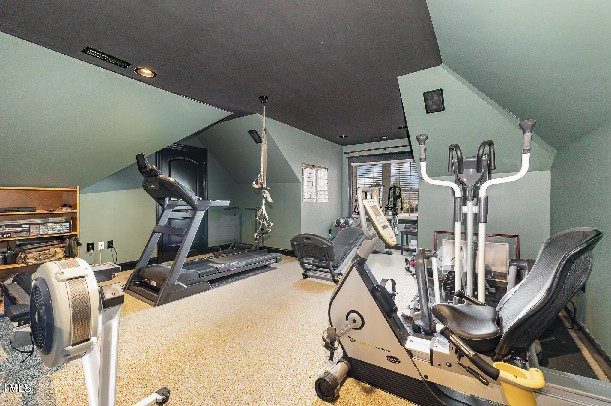 96 Barringer Drive Garner, NC 27529 - Photo 28 of 35 a view of a room with gym equipment