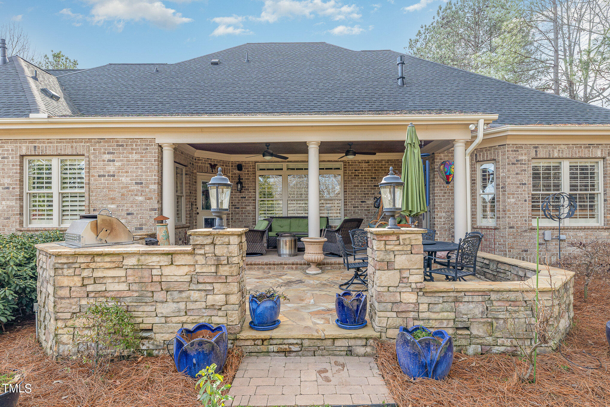 96 Barringer Drive Garner, NC 27529 - Photo 30 of 35 a view of the patio with dining table and chairs