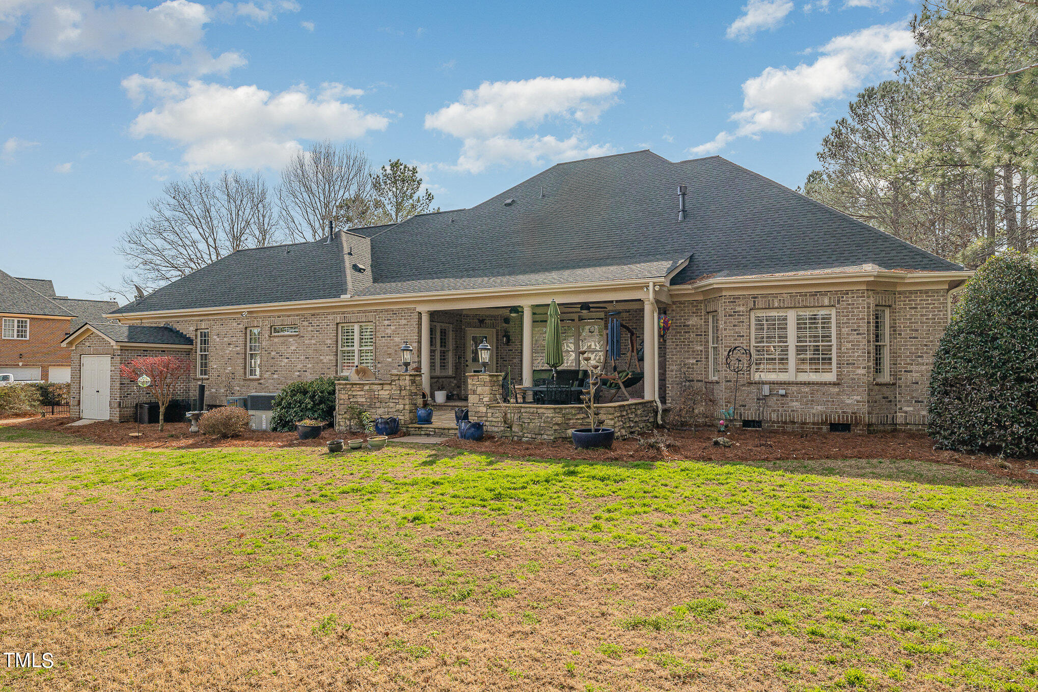 96 Barringer Drive Garner, NC 27529 - Photo 31 of 35 a view of a house with swimming pool and sitting area