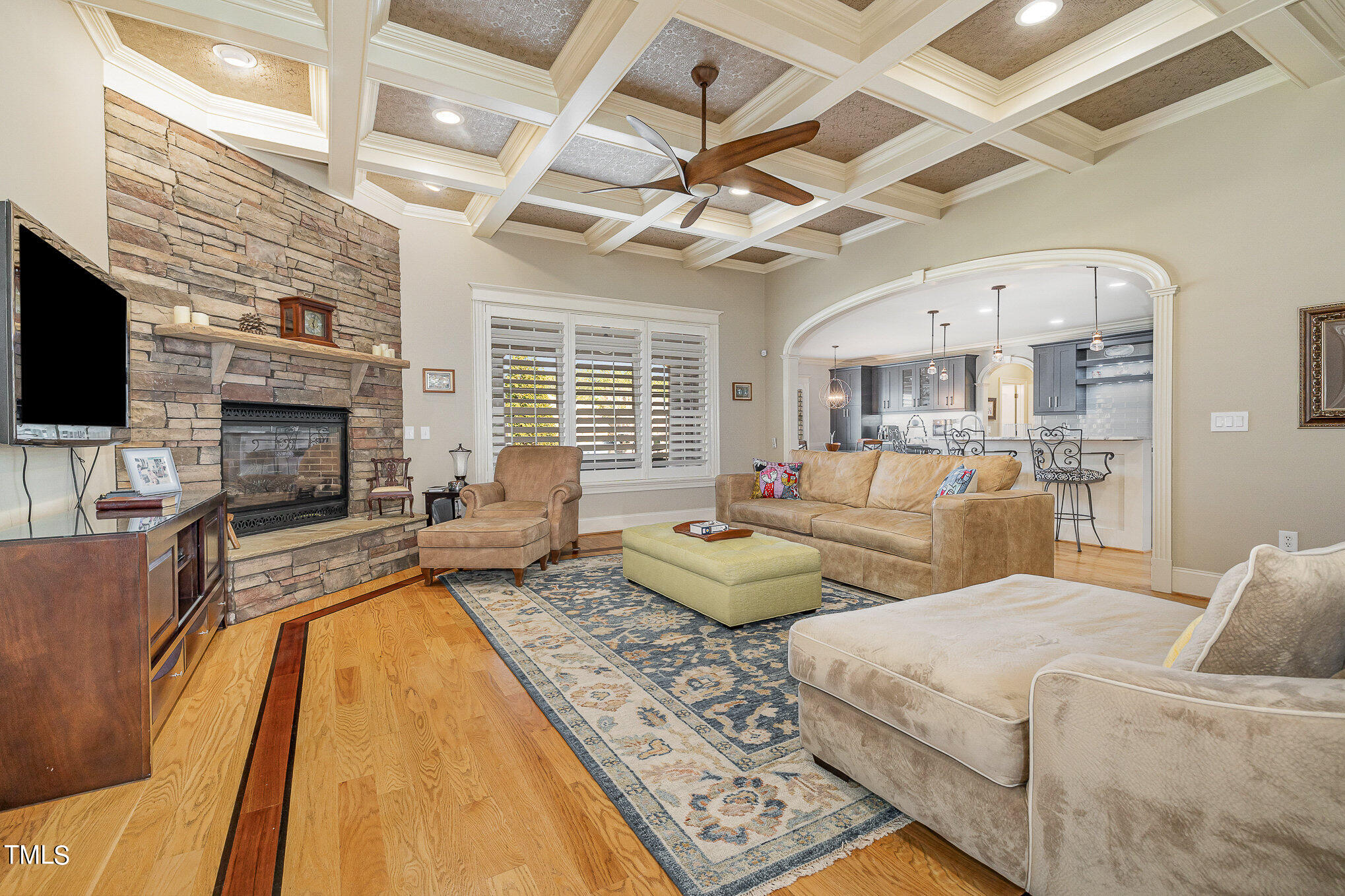 96 Barringer Drive Garner, NC 27529 - Photo 5 of 35 a large bedroom with furniture fireplace and a flat screen tv