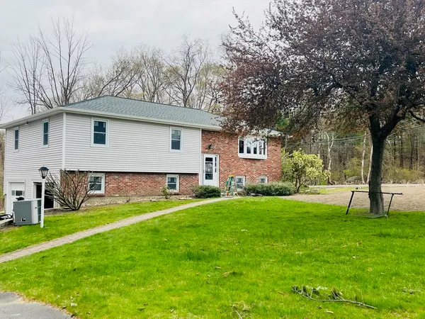 a view of a backyard with a garden