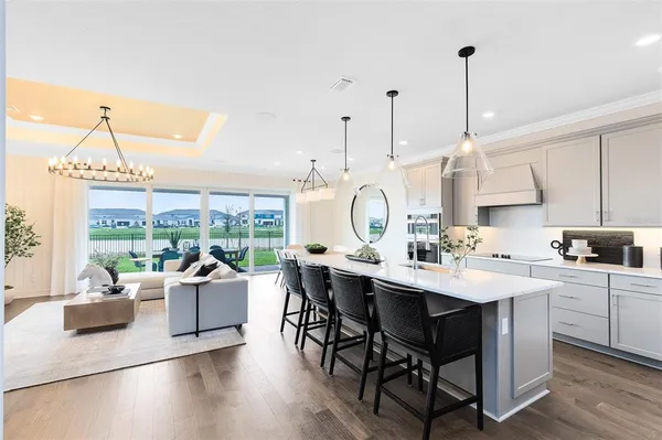 a view of a kitchen and dining area with furniture