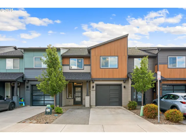 a backyard of a house with yard barbeque oven and outdoor seating