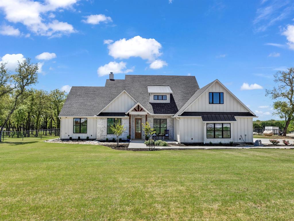 261 Greene Road Weatherford, TX 76087 - Photo 1 of 1 a front view of house with yard and green space