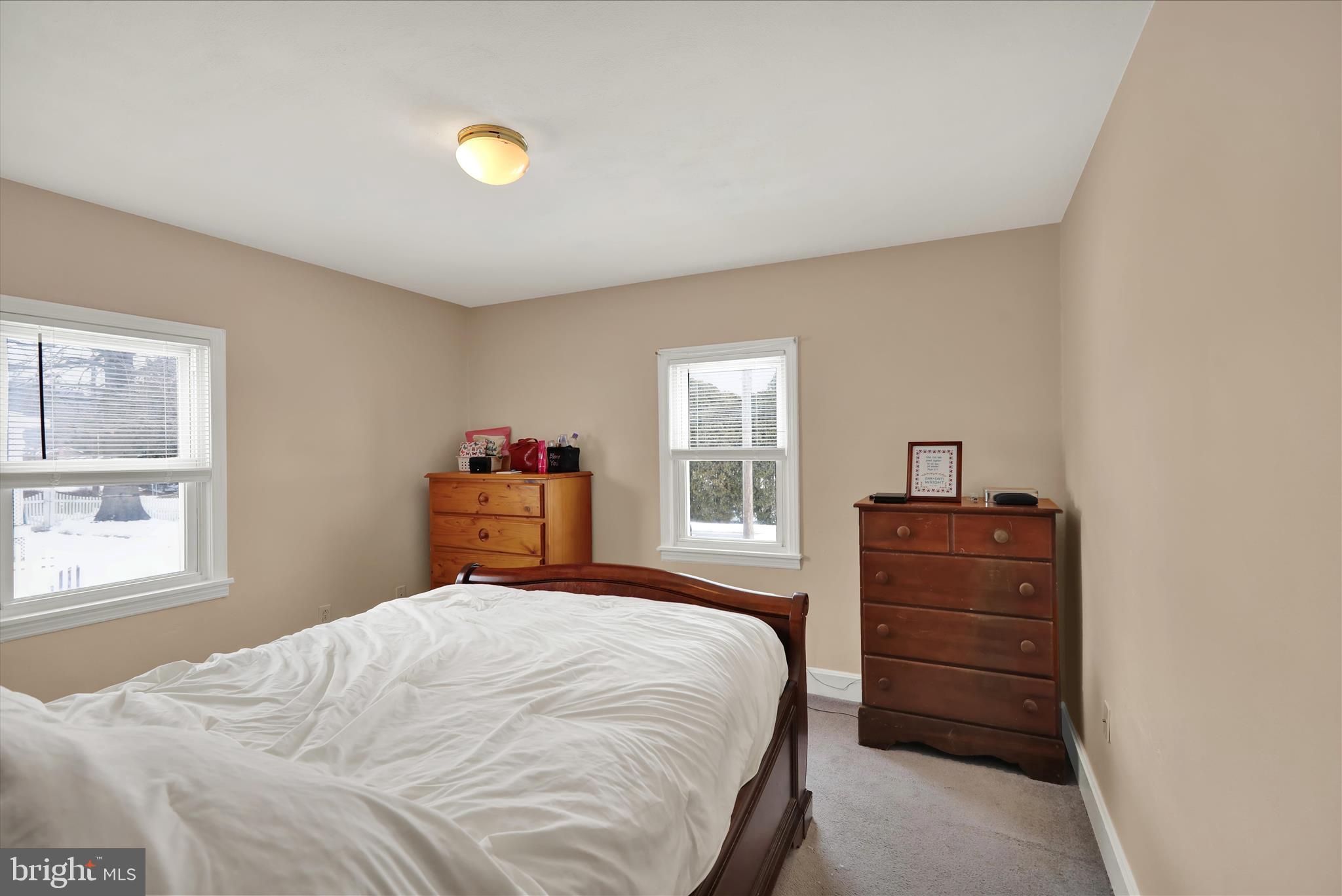 757 North Manor Road Elverson, PA 19520 - Photo 11 of 22 a bedroom with a bed and a window