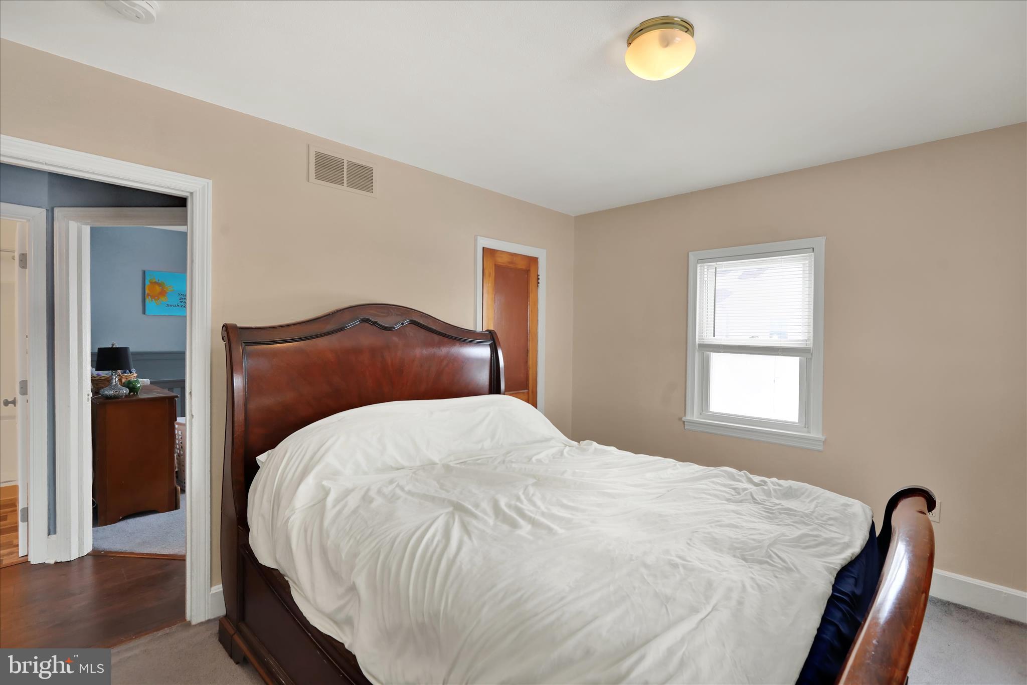 757 North Manor Road Elverson, PA 19520 - Photo 12 of 22 a bedroom with a bed and a window