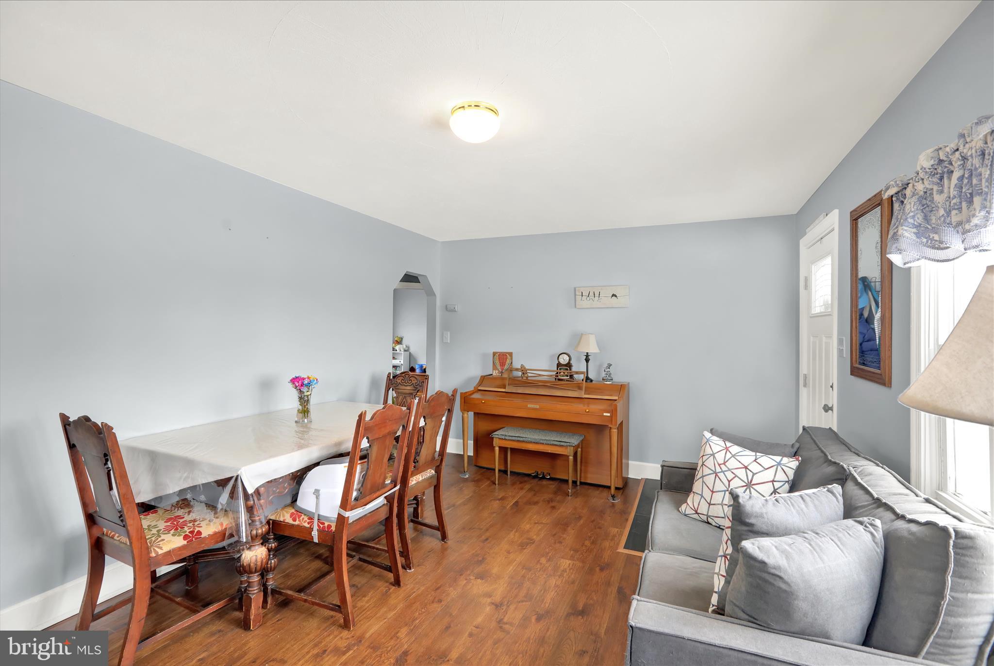757 North Manor Road Elverson, PA 19520 - Photo 14 of 22 a living room with furniture a piano and wooden floor
