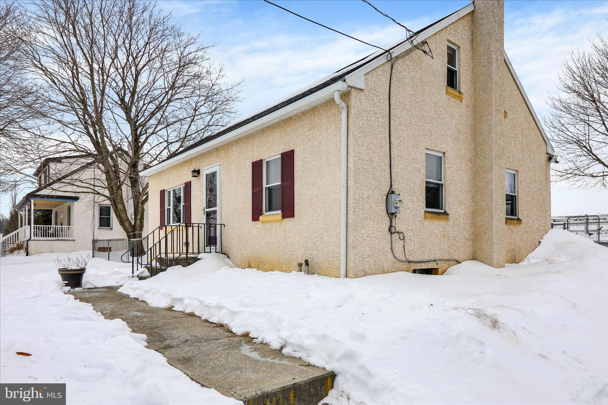 757 North Manor Road Elverson, PA 19520 - Photo 3 of 22 a view of a house with snow on the road