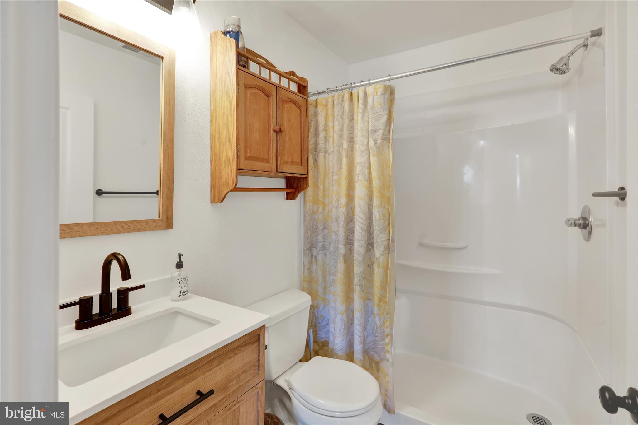757 North Manor Road Elverson, PA 19520 - Photo 9 of 22 a bathroom with a sink a toilet and shower