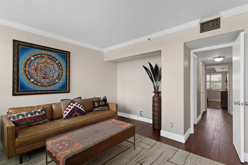 3095 North Course Drive, Unit 203 Pompano Beach, FL 33069 - Photo 20 of 49 a living room with furniture and wooden floor