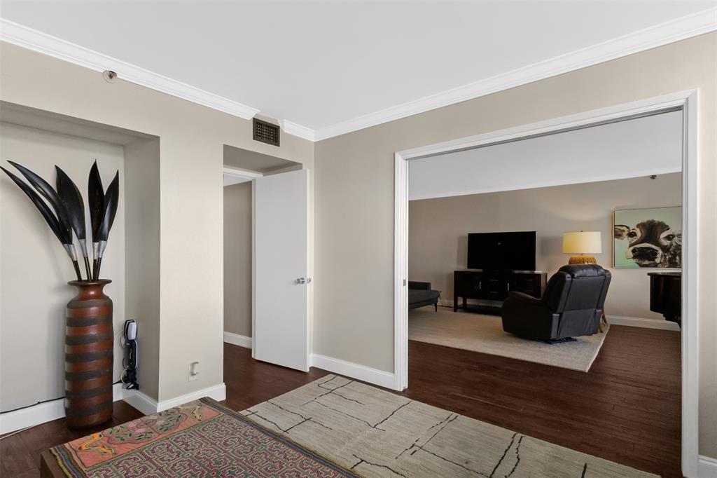 3095 North Course Drive, Unit 203 Pompano Beach, FL 33069 - Photo 23 of 49 a living room with furniture and a flat screen tv