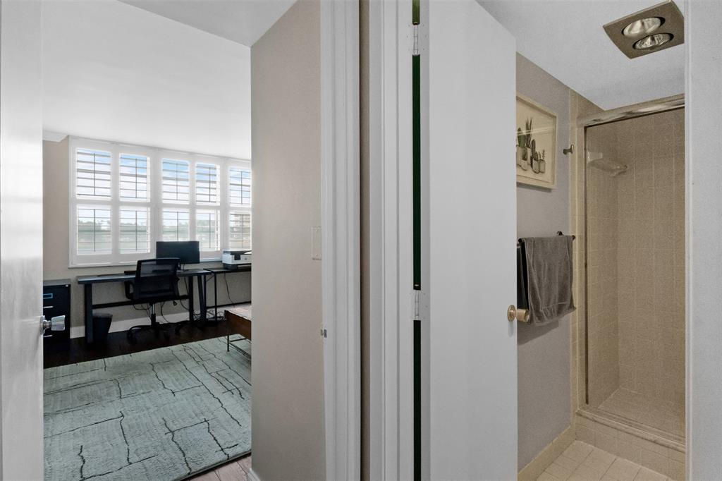 3095 North Course Drive, Unit 203 Pompano Beach, FL 33069 - Photo 36 of 49 a living room with furniture and a window