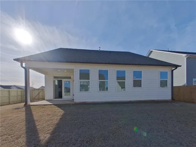 a house view with a outdoor space