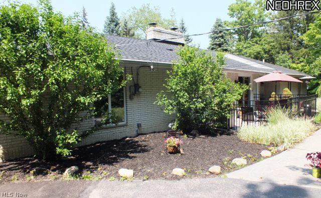 Welcome - this Pepper Pike treasure is tucked away and offers a beautiful setting. This home has four large bedrooms, three are on the main floor with a full bathroom and the largest bedroom is on the walk-out lower level with sliders to outside which current residents use as Master Suite.