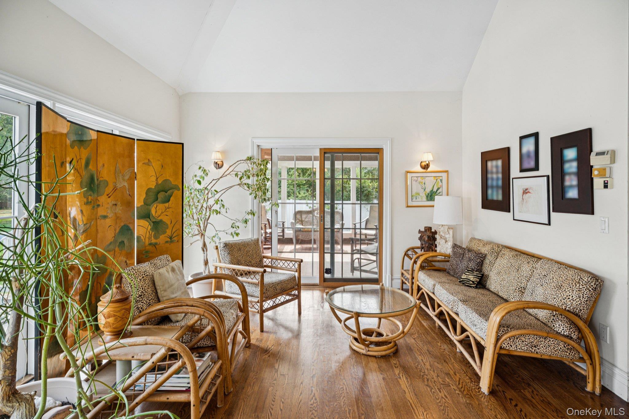 12 Laila Lane Remsenburg, NY 11960 - Photo 10 of 50 a living room with furniture and wooden floor