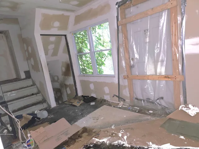 a view of an empty room with a window