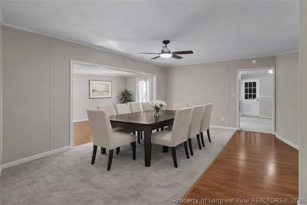 a view of a dining room with furniture