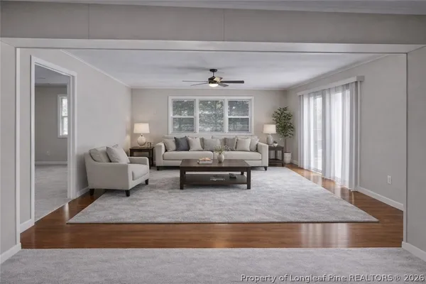 a living room with furniture and a window